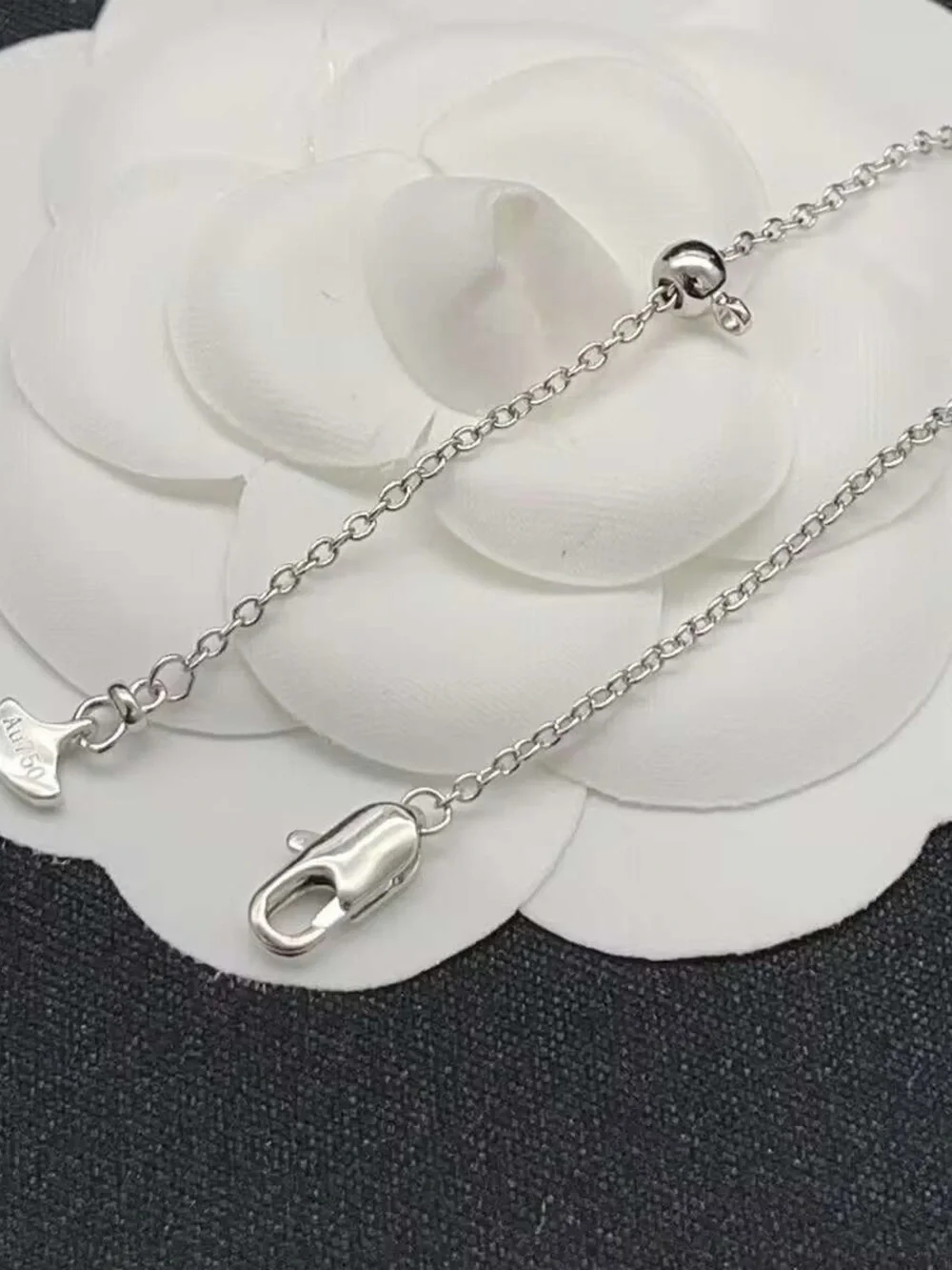 Delicate White Floral Crystal Necklace in Silver Tone
